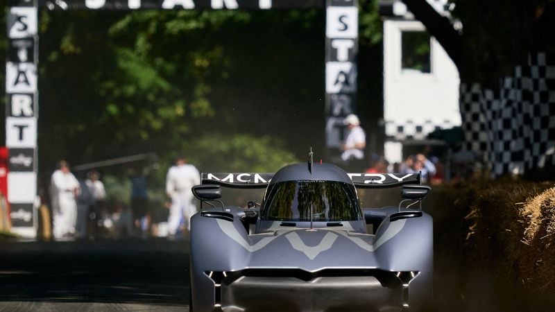 Cars racing up the Goodwood Hillclimb at Festival of Speed