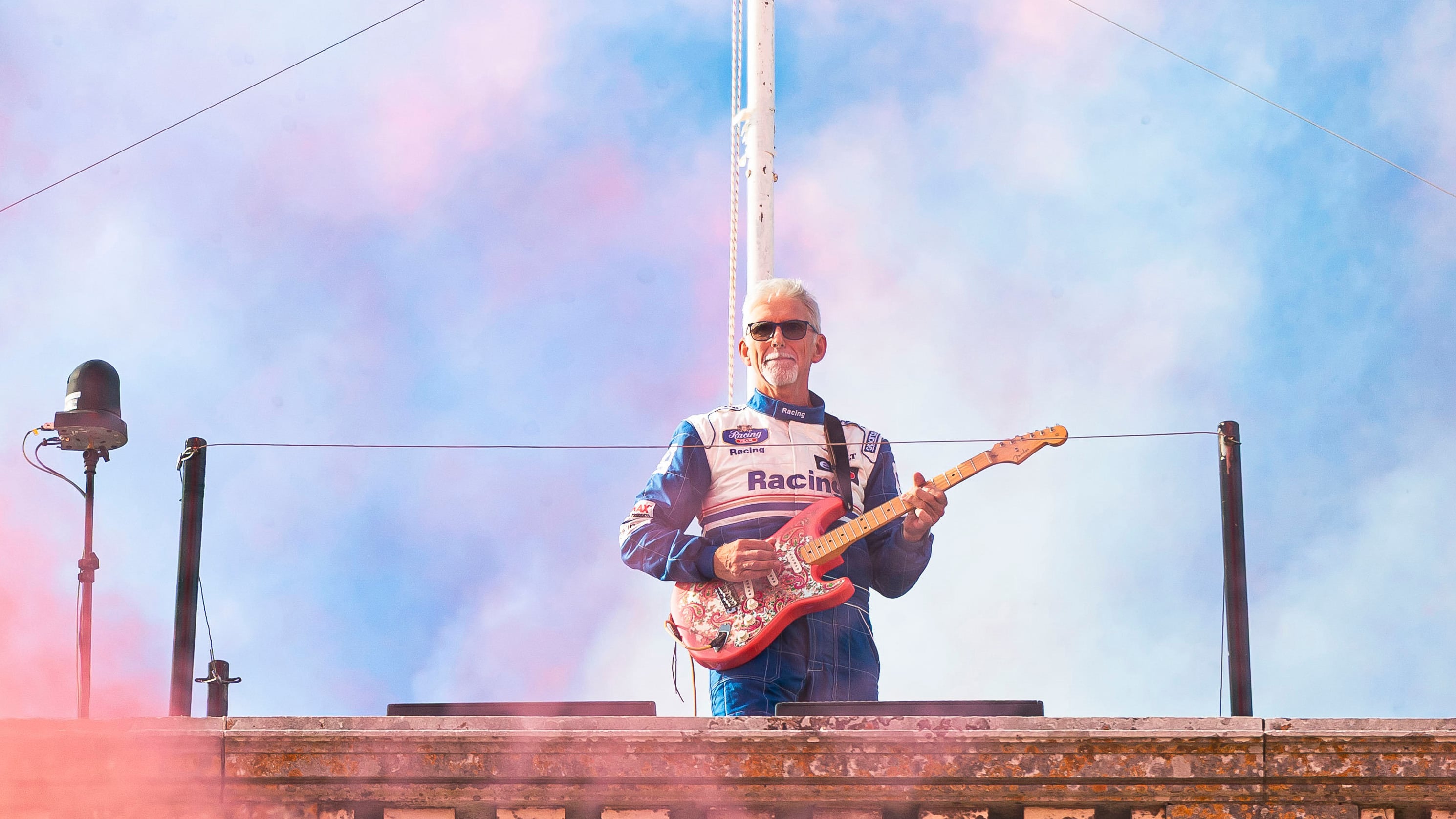At the 2026 Festival of Speed, Hill and his guitar wowed crowds on the roof of Goodwood House.