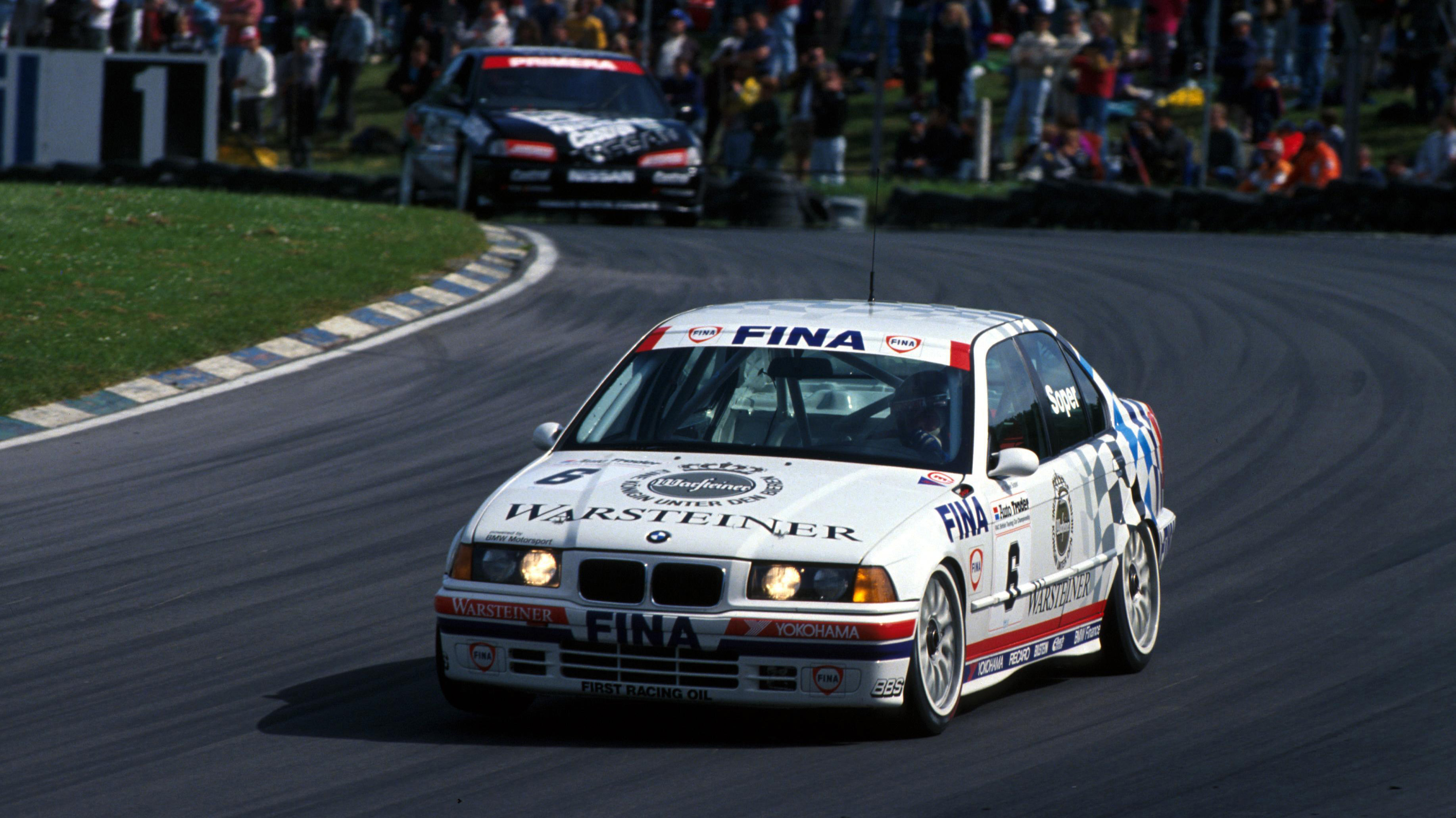 Soper drives the Schnitzer BMW 318i at Brands Hatch, June 1993.