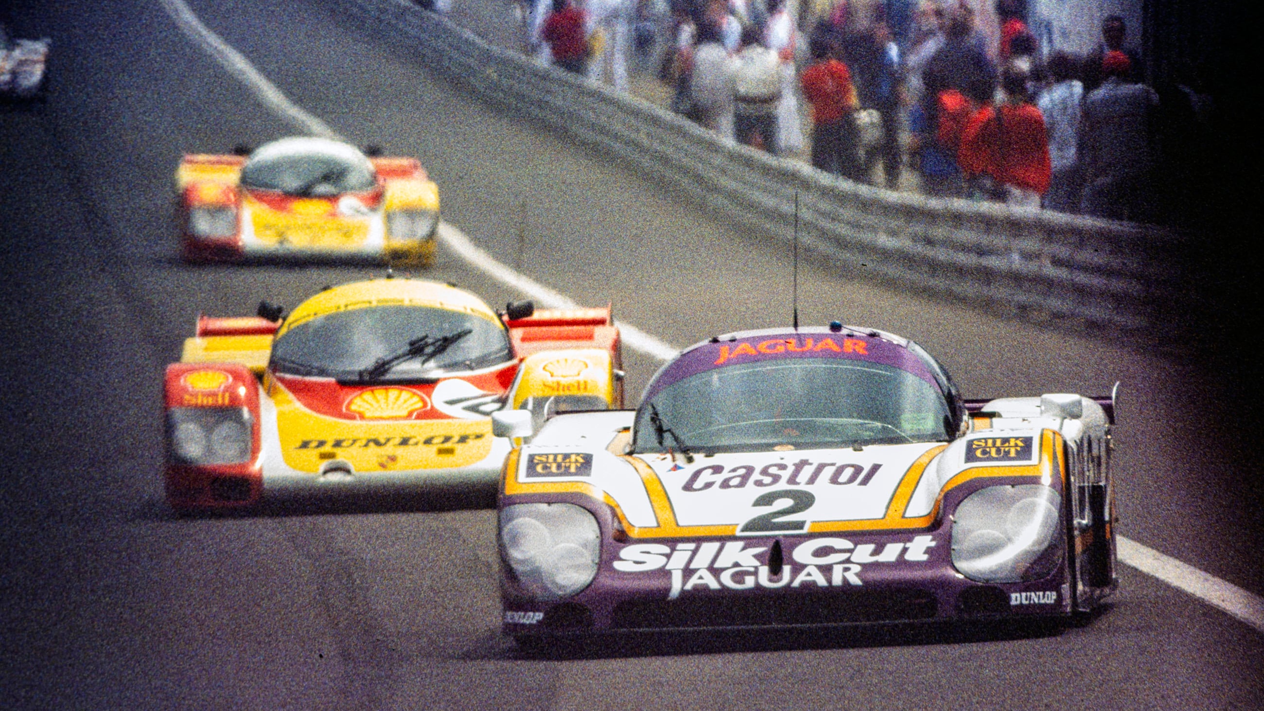 Jaguar finally made it to the top of the podium at Le Mans as the new 7.0-litre XJR-9LM saw off a fierce Porsche challenge.