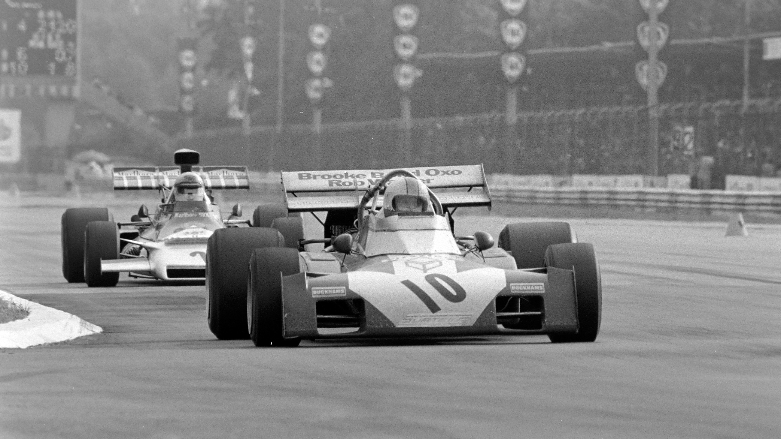 Hailwood, driving his Surtees TS9B, leads Howden Ganley's BRM on his way to second place at the 1972 Italian Grand Prix at Monza.