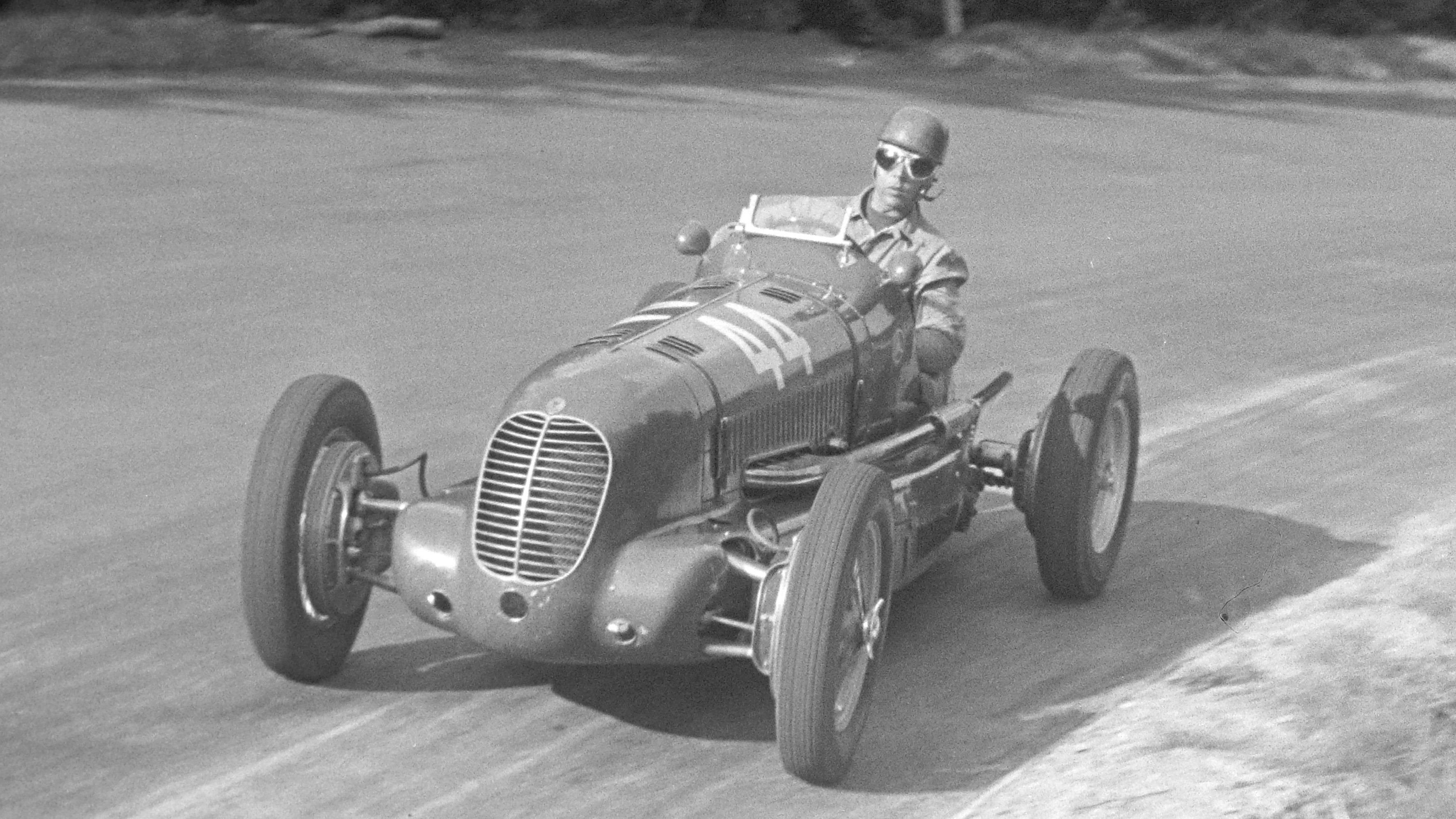 Franco Cortese drives a Maserati 6CM at the German Grand Prix at the Nürburgring, July 1938.