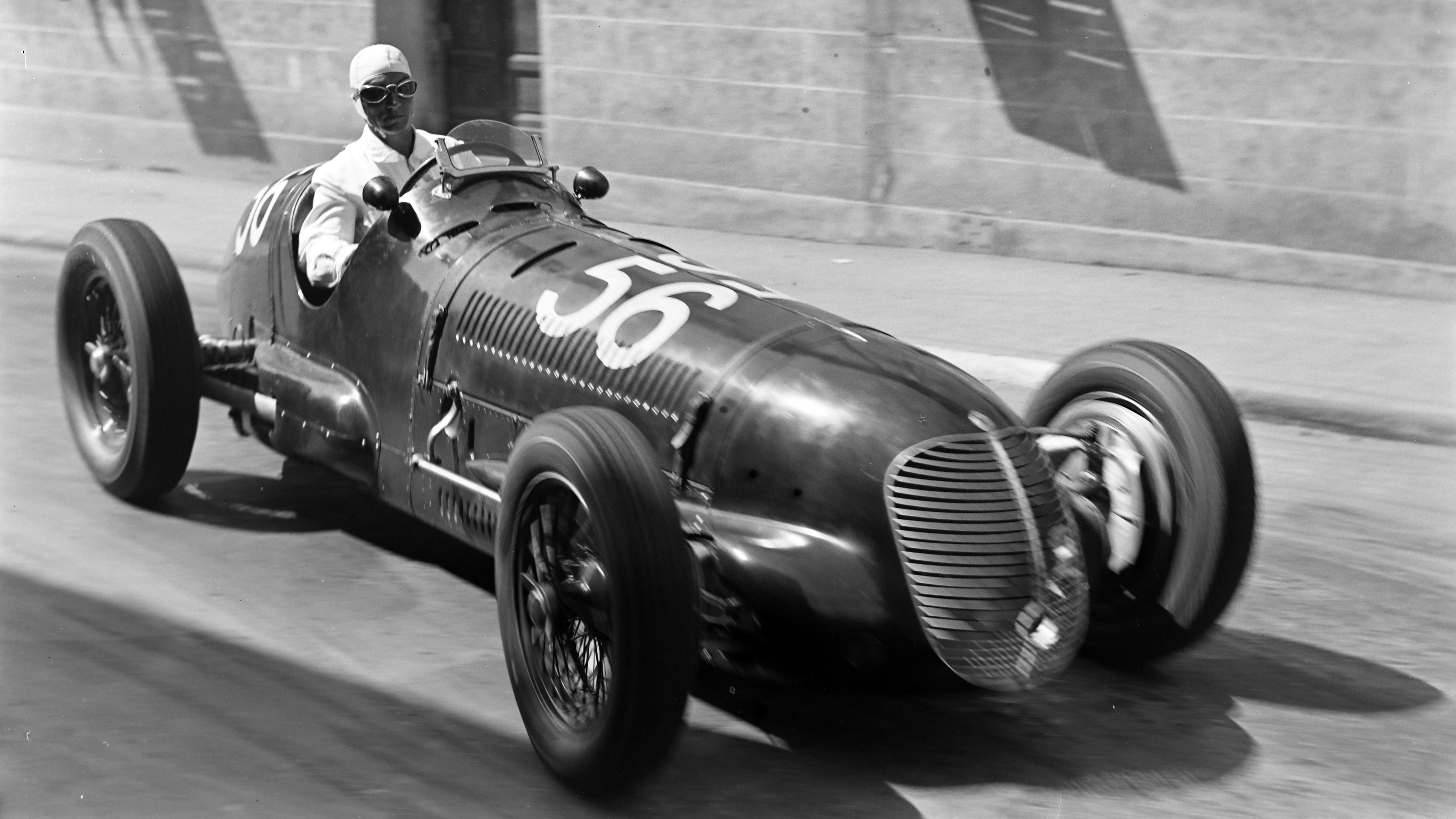 A Maserati 8CTF is driven by Carlo Felice Trossi during the Coppa Ciano at Livomo, August 1938.