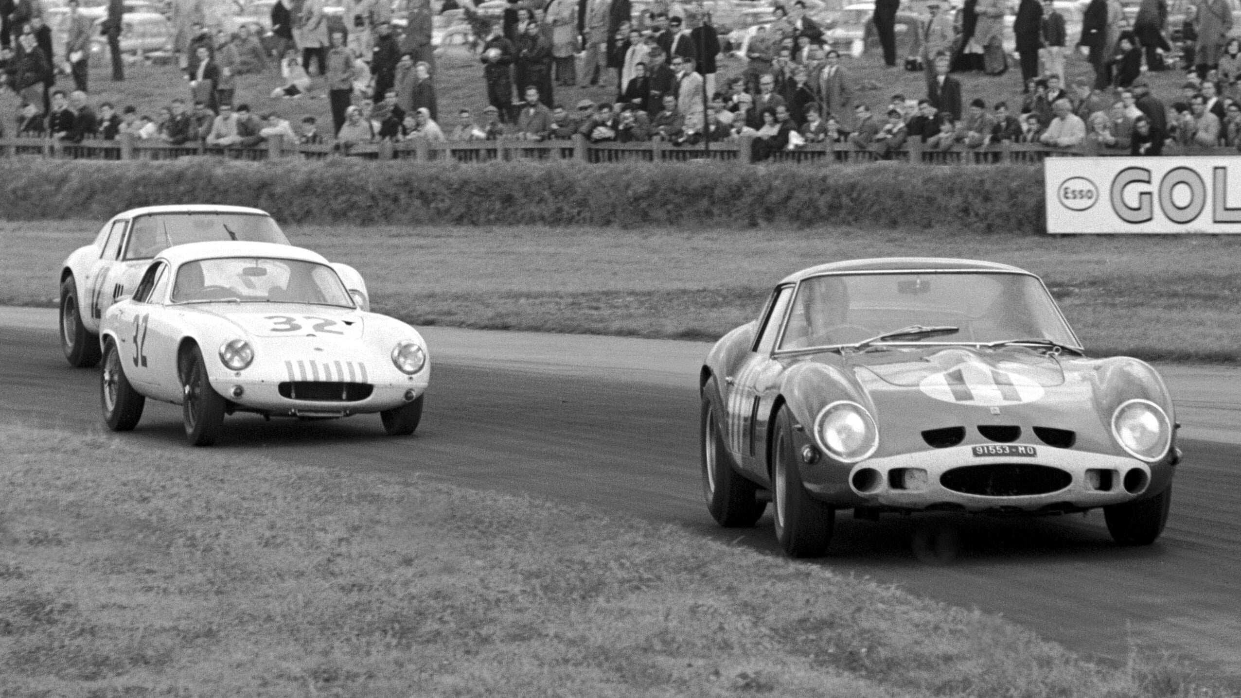 The Ferrari 250 GTOs of Graham Hill and Mike Parkes lap a Lotus Elite on their way to a 1-2 finish at the 1963 Tourist Trophy.