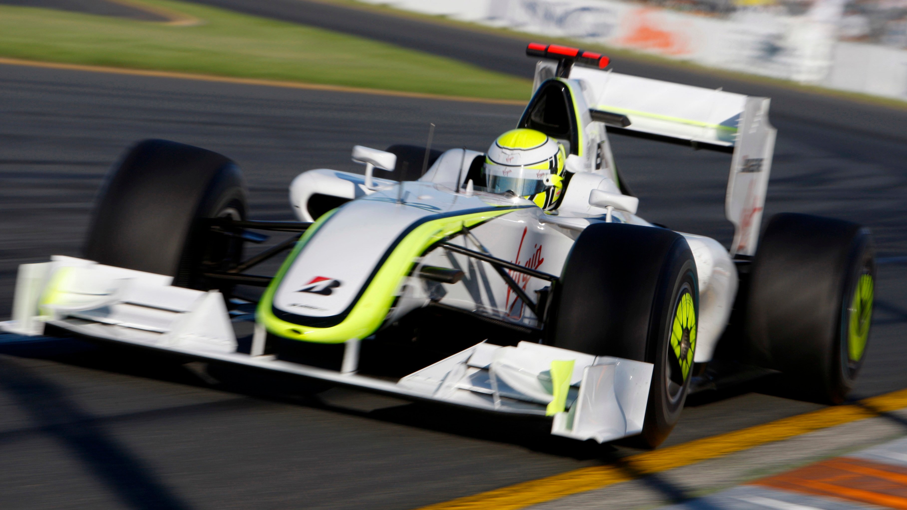 While Honda tested it, the Brawn BGP001 never ran with KERS, but both designs sported a double diffuser. 