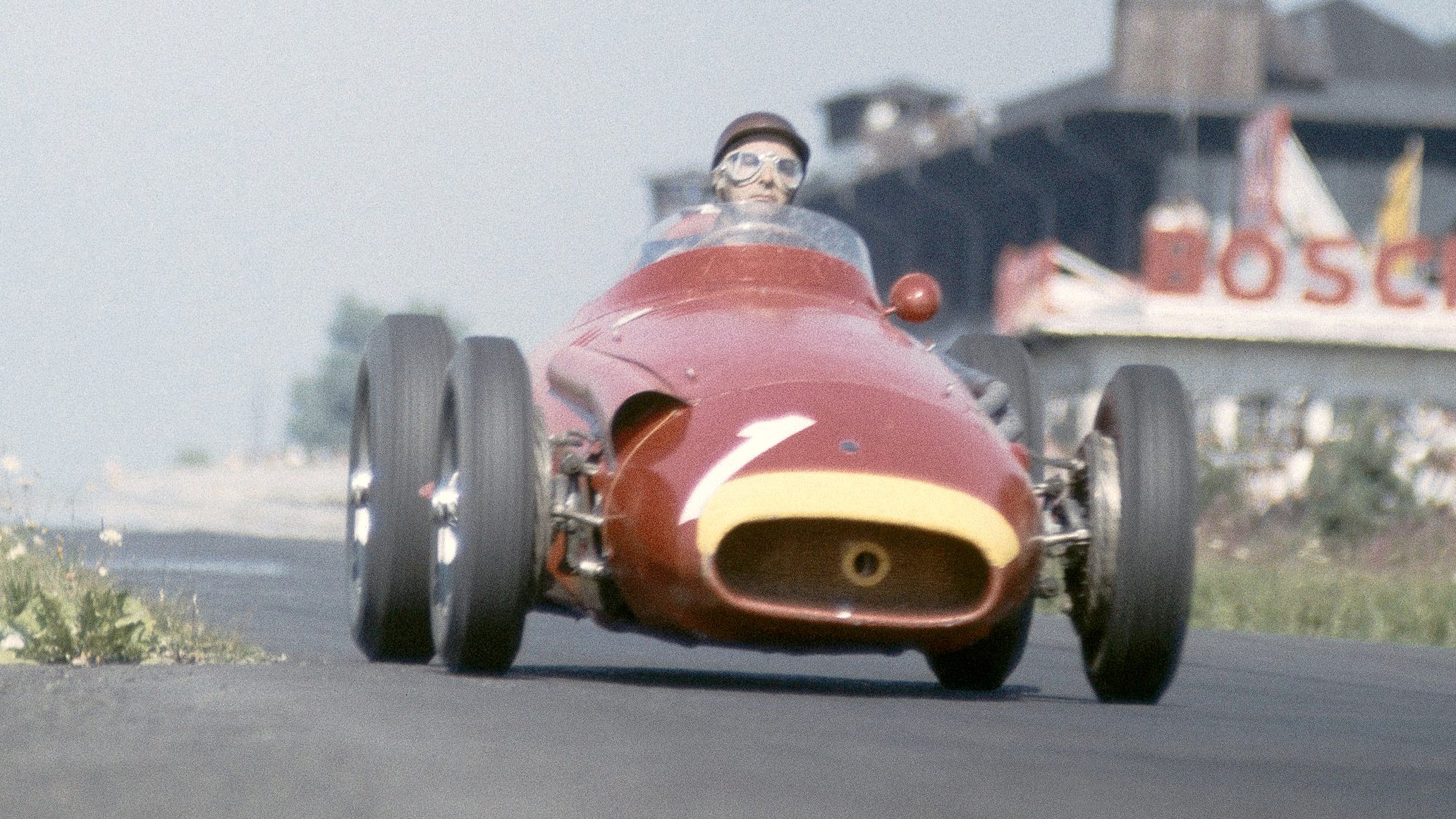 Juan Manuel Fangio races his Maserati 250F at the Nürburgring at the German Grand Prix, August 1957.