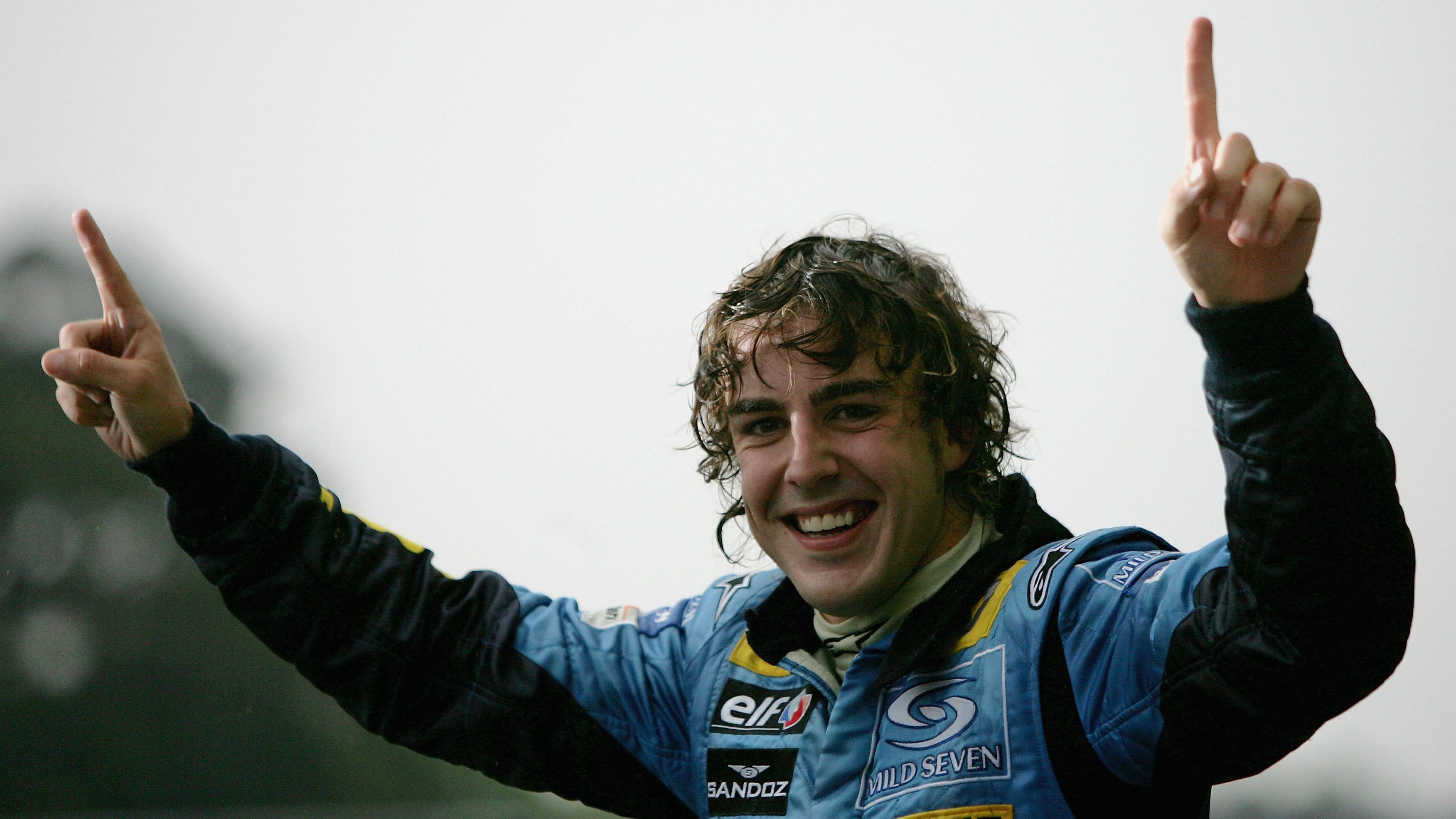 Fernando Alonso celebrates winning his first F1 World Championship after finishing third at the 2005 Brazilian Grand Prix.