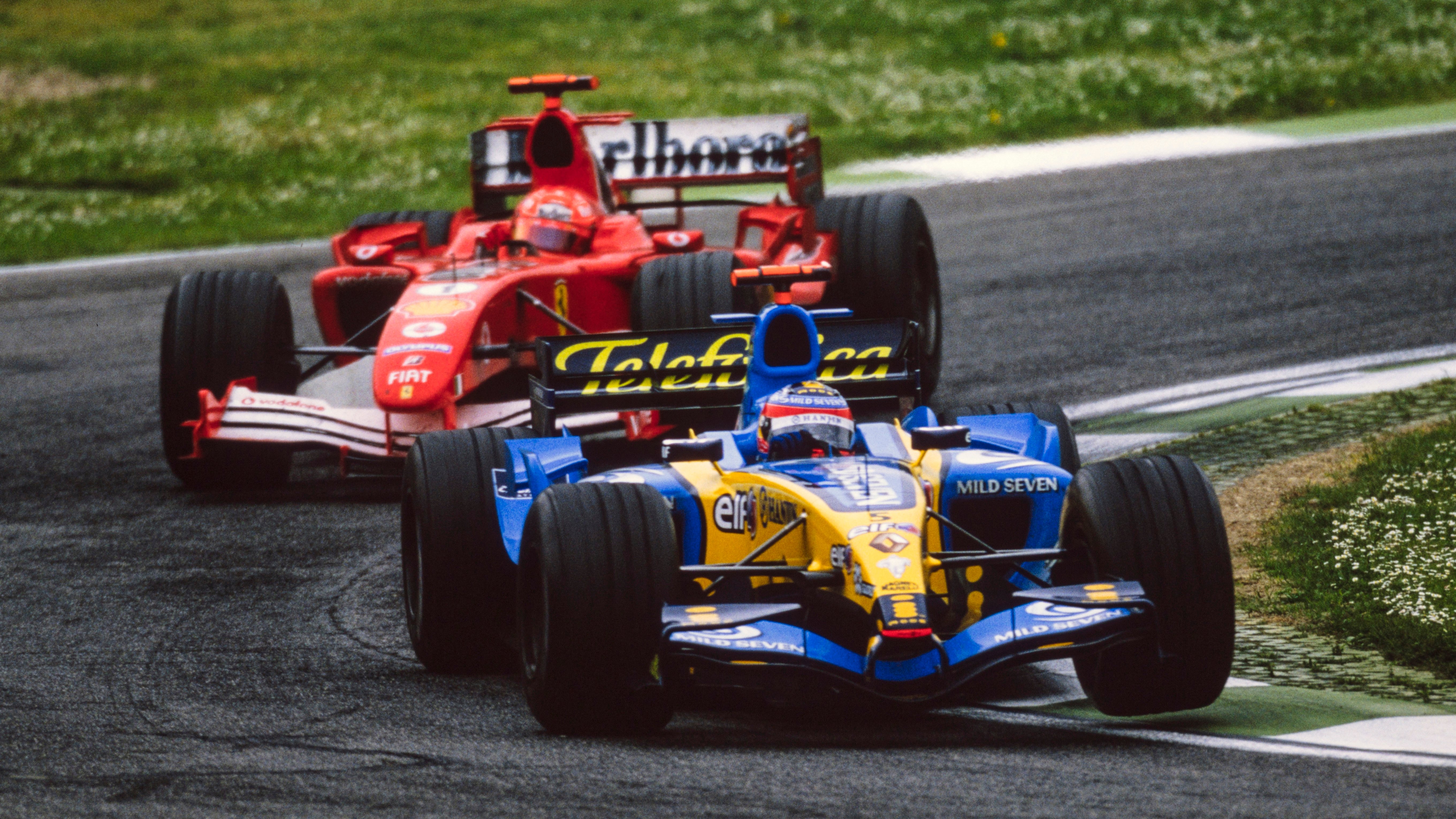 Alonso leads Schumacher to a 1-2 finish at the San Marino Grand Prix, April 2005.