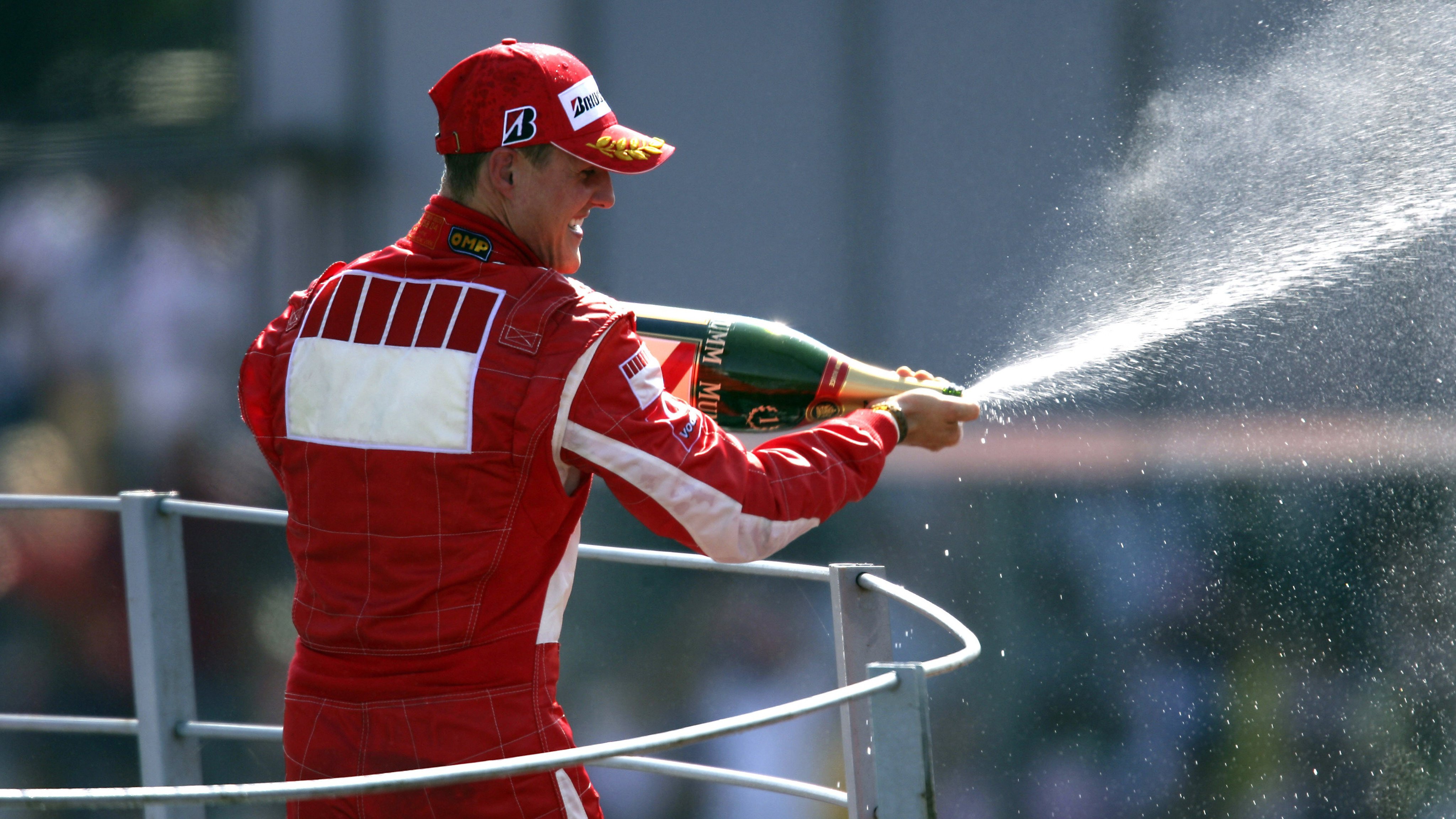 Schumacher celebrates winning the 2006 Italian Grand Prix at Monza, his seventh win of the campaign in a championship charge.