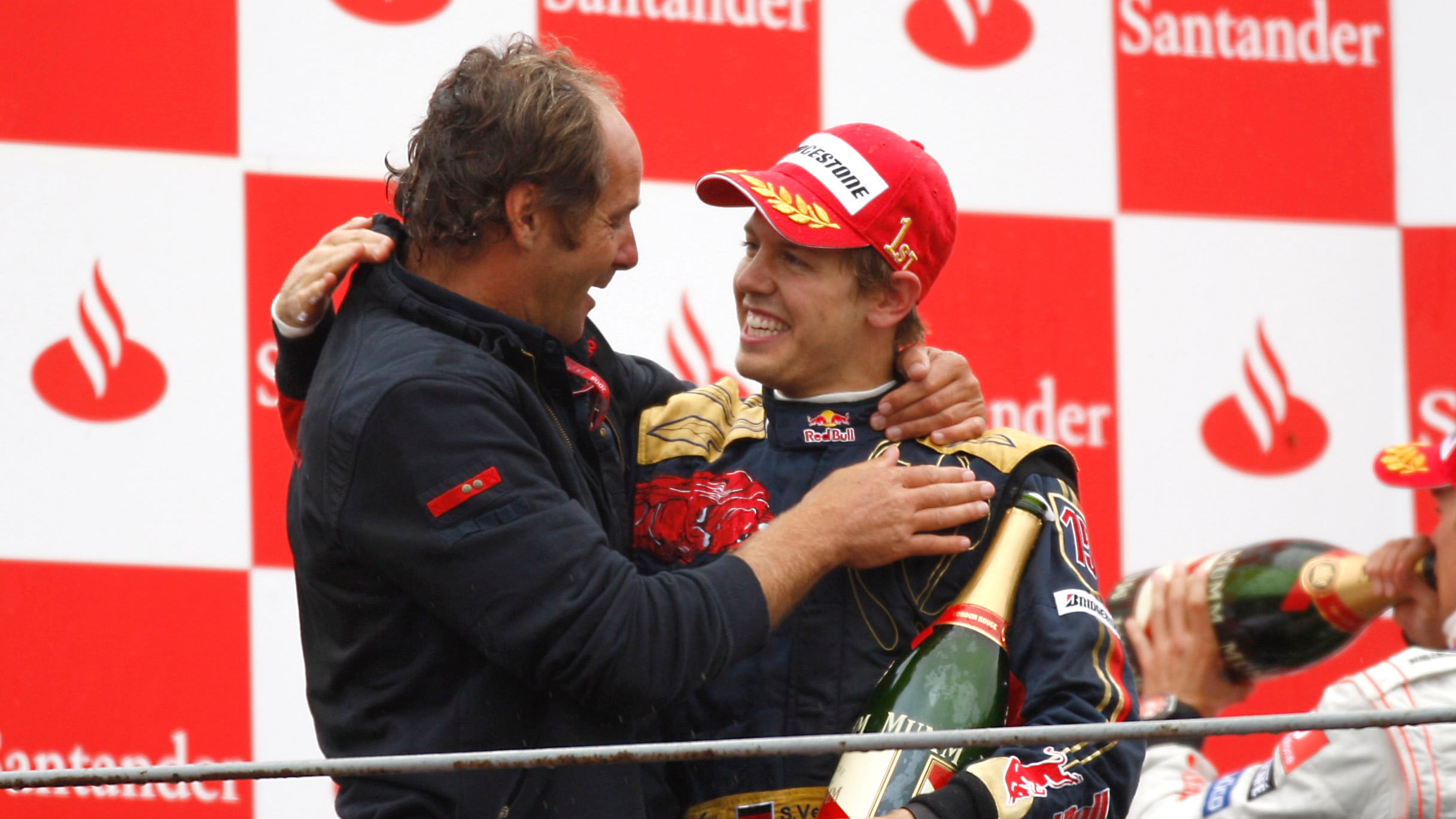 Toro Rosso co-owner Berger joins Sebastian Vettel after the German claims his and the team’s first F1 victory at the Italian Grand Prix, September 2008.