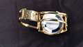 Stirling-Moss-Memorabilia-Sale-Gold-Watch-Strap-Silverstone-Auctions-Goodwood-13112020.jpg
