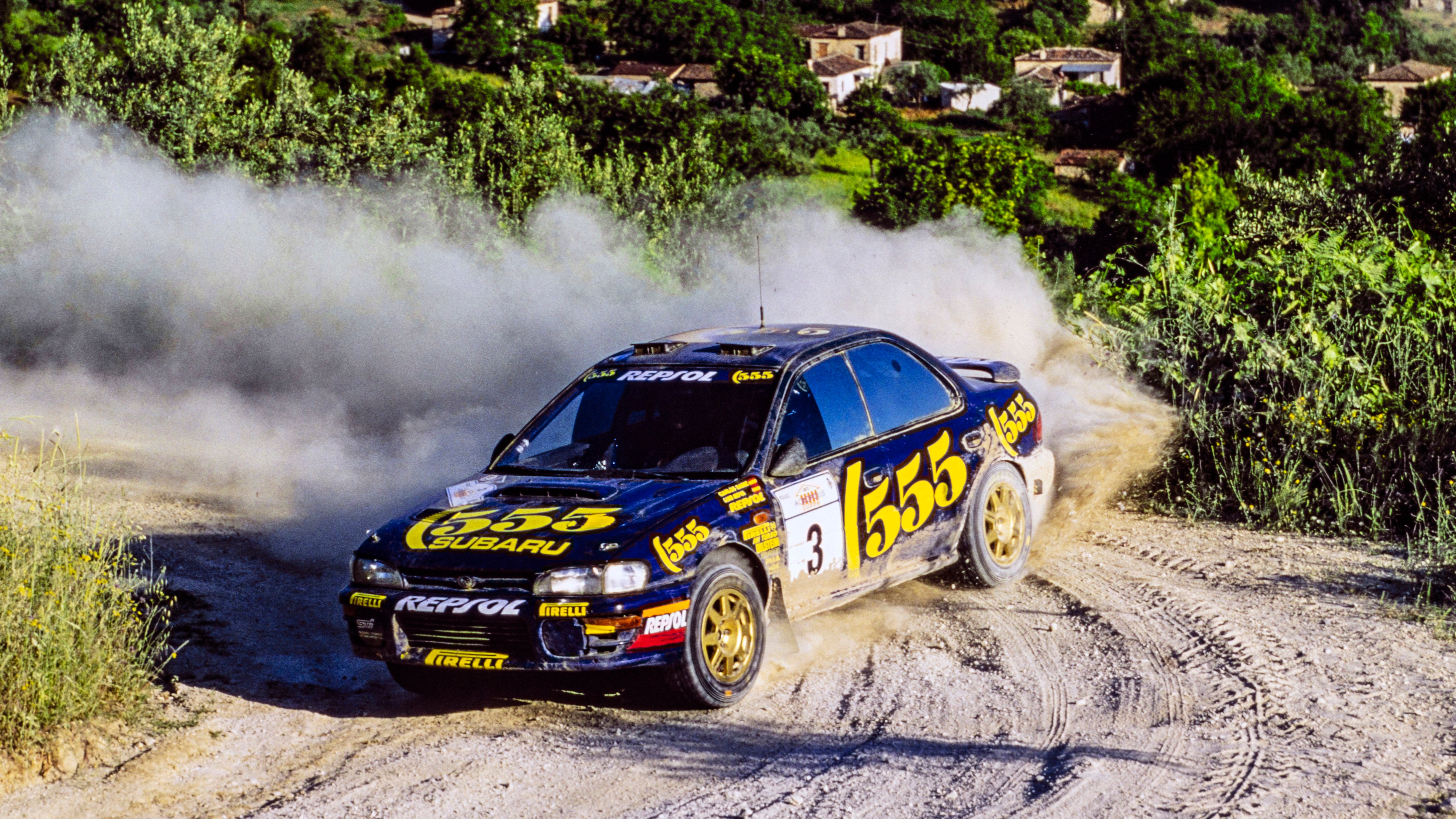 Carlos Sainz Sr. drives his Subaru Impreza at the Acropolis Rally in May 1994. 