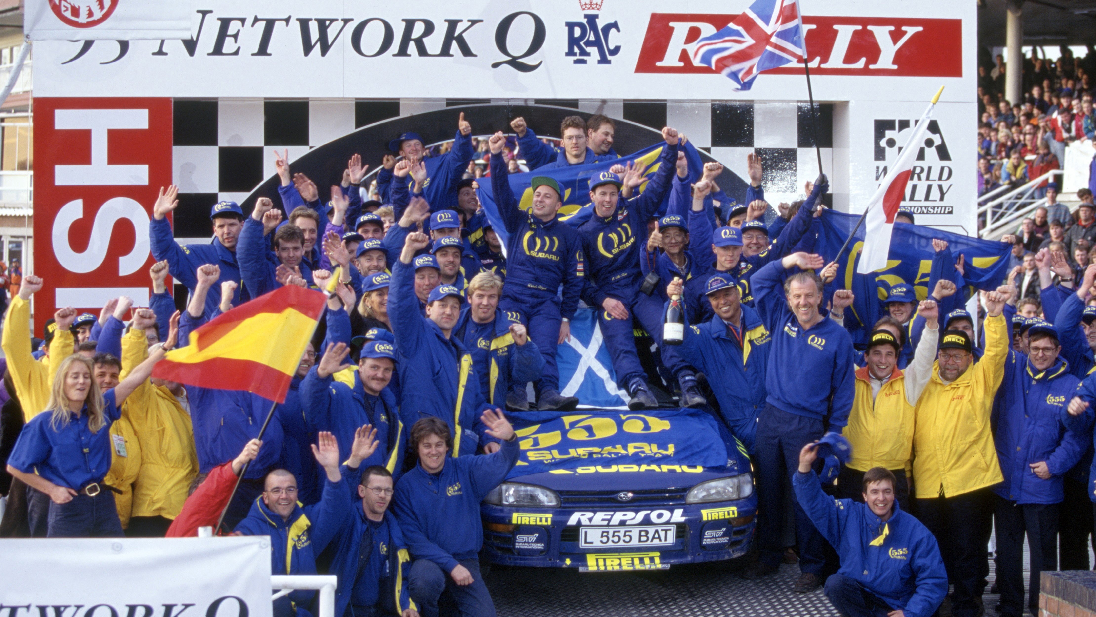 Colin McRae and team celebrate winning the Championship after the Rally of Great Britain in November 1995. 