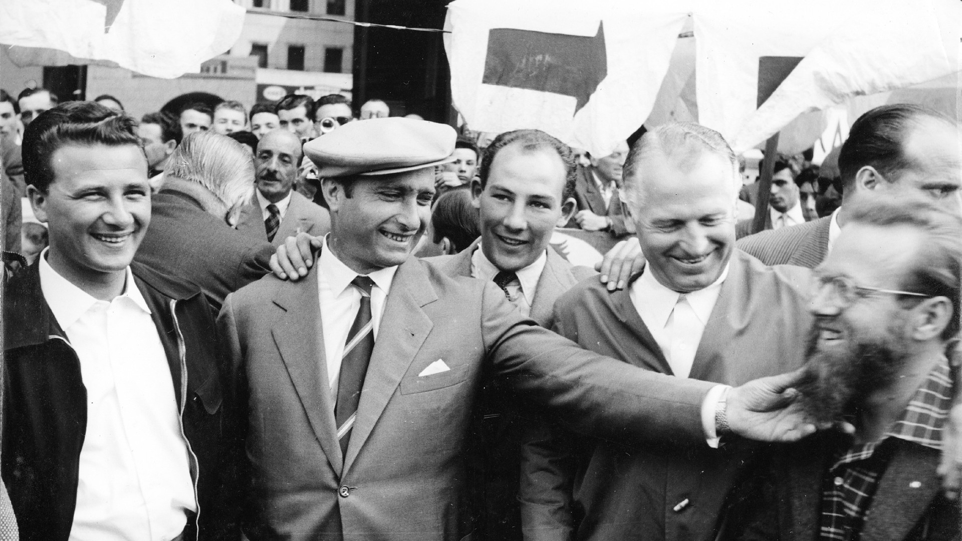 A young Herrmann with Fangio, Moss, Karl Kling and bearded Jenks - Mille Miglia Mercedes team-mates, 1955.