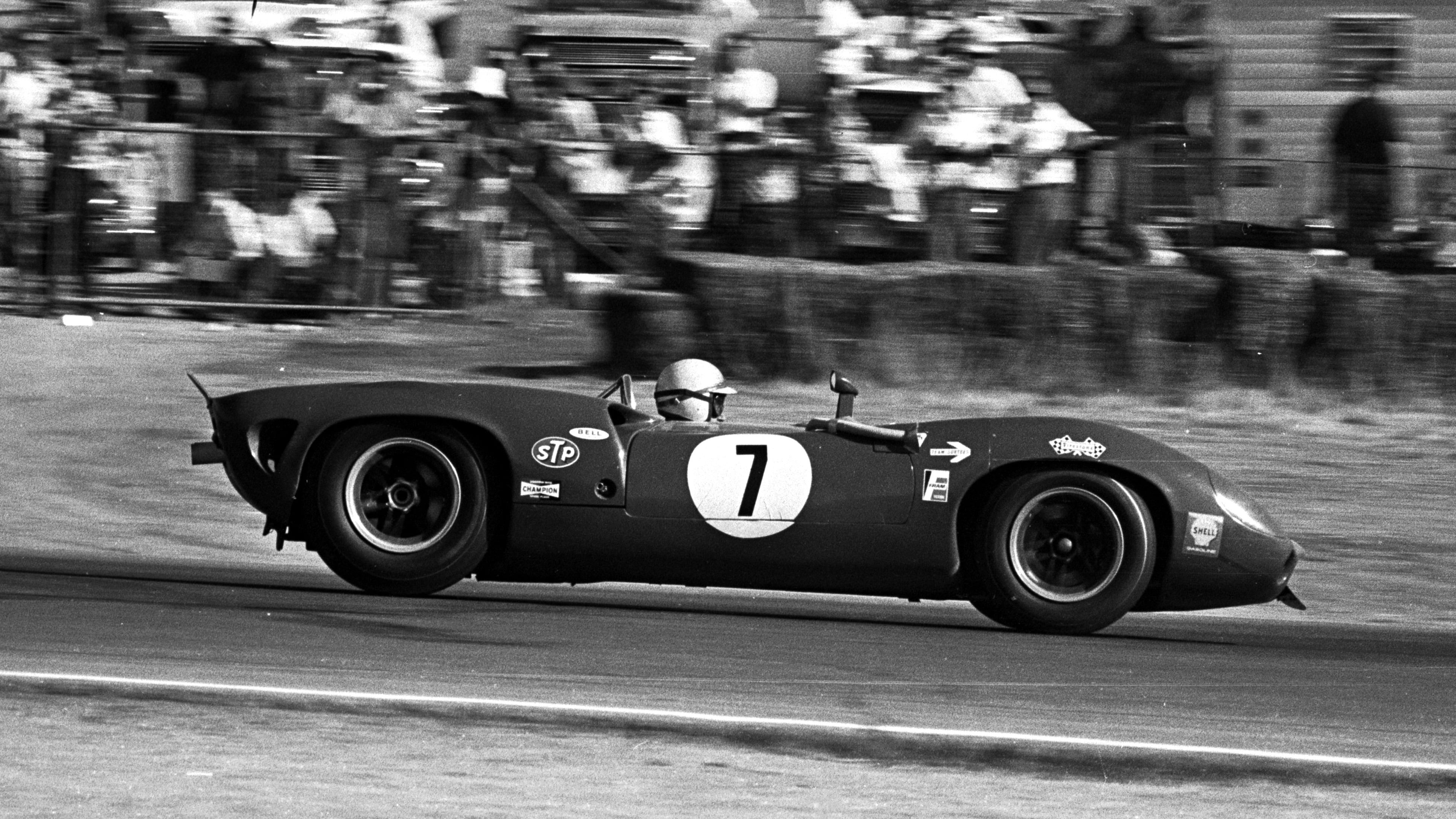 John Surtees' Lola T70 leads the fifth round of the 1966 Can-Am Challenge Cup at Riverside, California, his second win of the season.