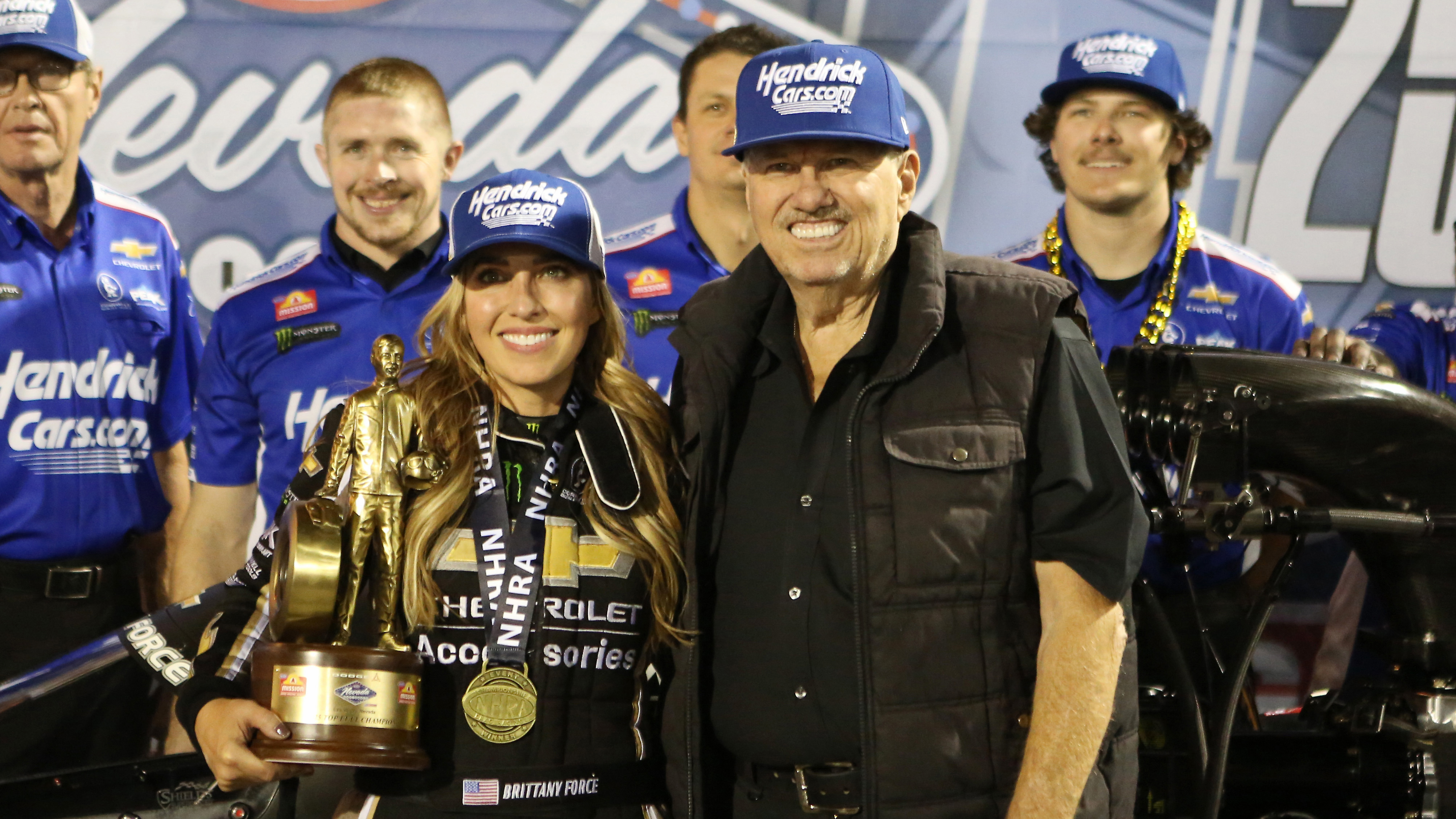 Winner of the Dodge NHRA Nevada Nationals Brittany Force celebrates with her father, John, November 2025. 