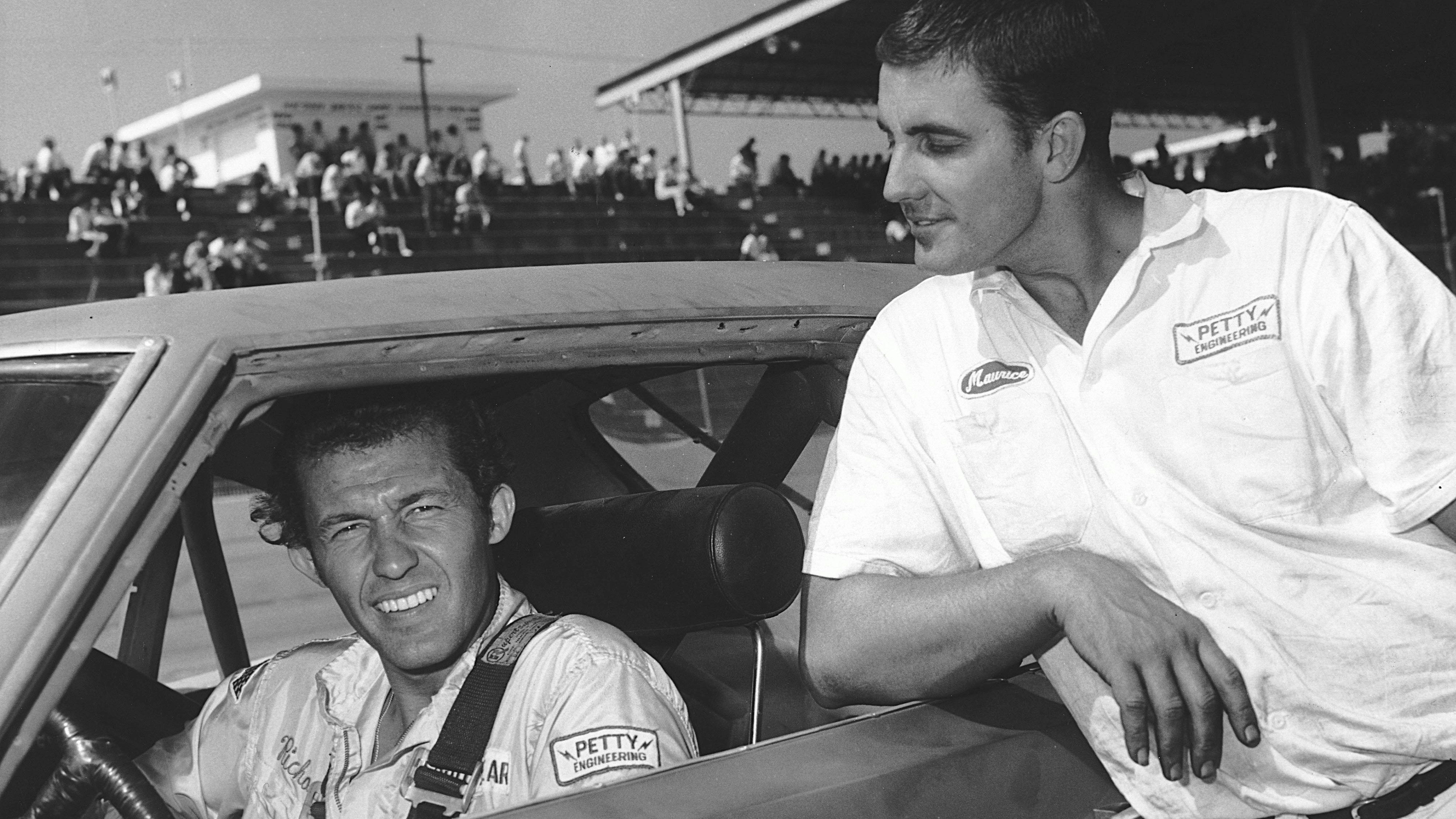 Maurice Petty (R) checks in on his brother, Richard. 