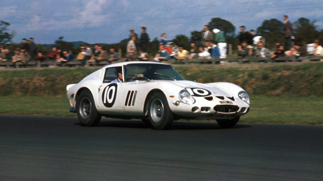 Graham Hill racing to second place in the #10 John Coombs Ferrari 250 GTO during the RAC Tourist Trophy at Goodwood on 18th August 1962