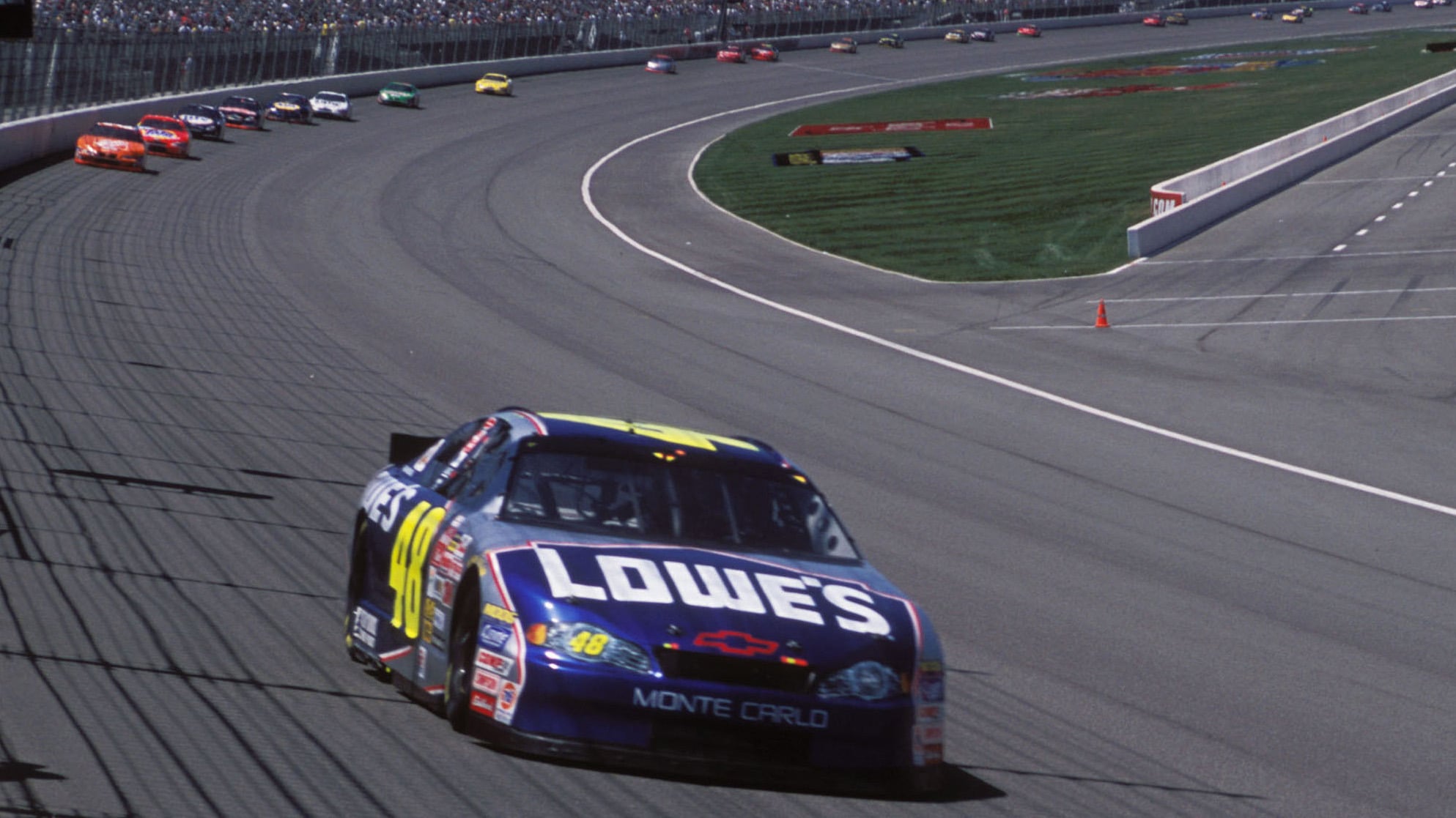 Johnson extends his lead of the
NASCAR Winston Cup NAPA Auto Parts 500 race at California Speedway, on his way to scoring his first NASCAR victory in his rookie season, April 2002.