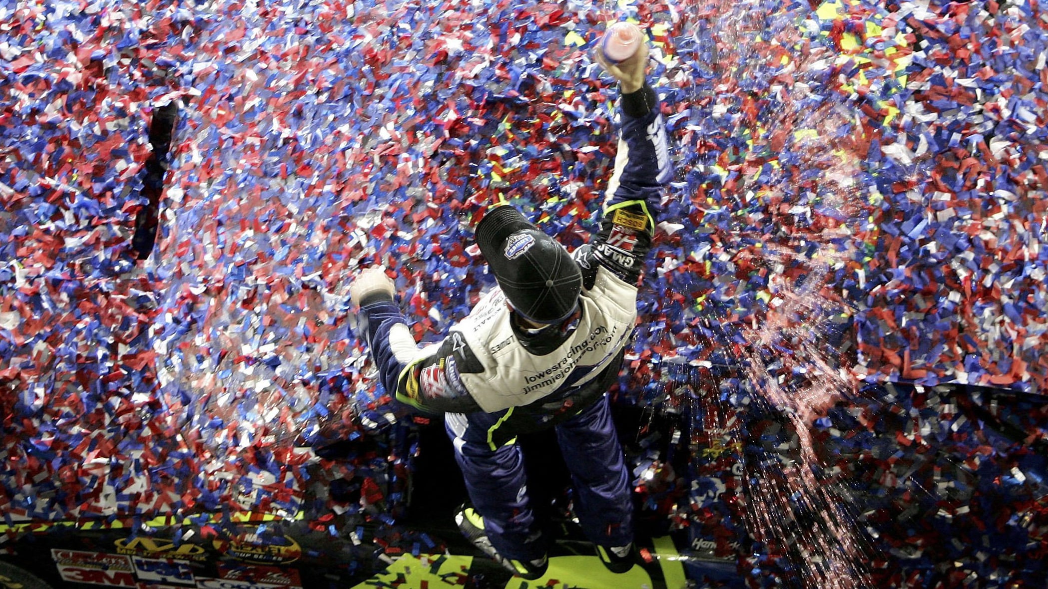 Johnson celebrates in victory lane having made his way through the grid to win the 2006 Daytona 500.
