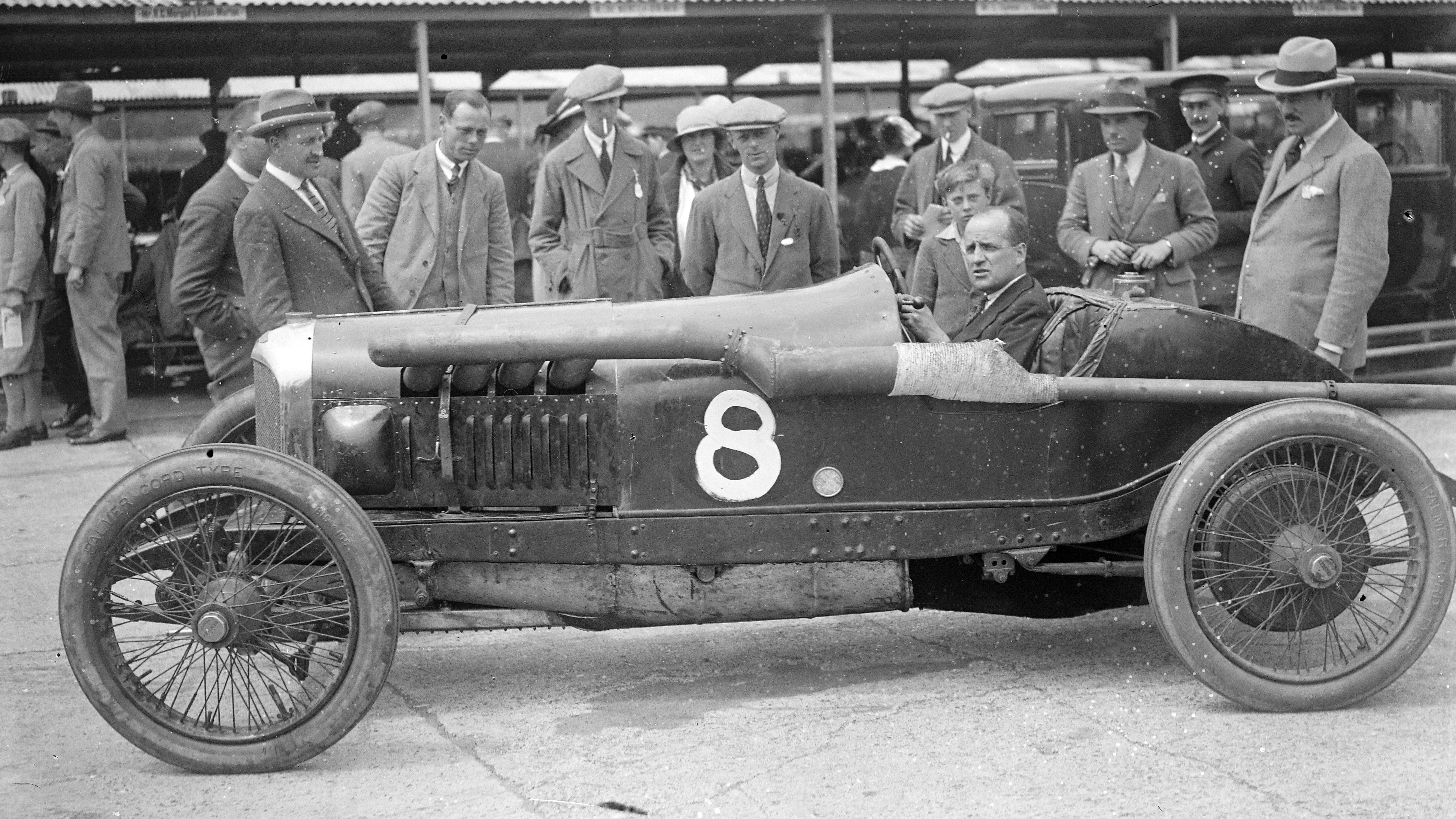 Dudley Benjafield sits in his Bentley during the BARC Whit Monday Meeting at Brooklands, June 1924.