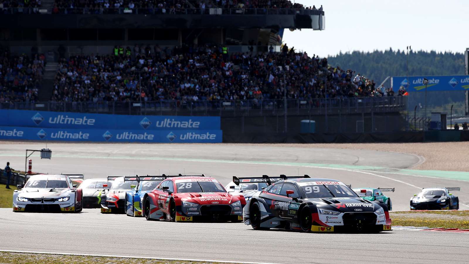 Audi and BMW race in the DTM at the Nürburgring