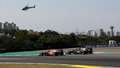 F1-2021-Brazil-Lewis-Hamilton-Mercedes-W12-Max-Verstappen-Red-Bull-RB16B-Off-Track-Charles-Coates-MI-Goodwood-15112021.jpg
