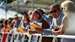 The crowd at 'Glorious Goodwood' enjoying the horseracing from the rail.