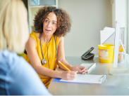 Gp practitioner talking to patient