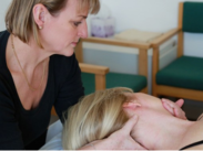 A woman is having physiotherapy