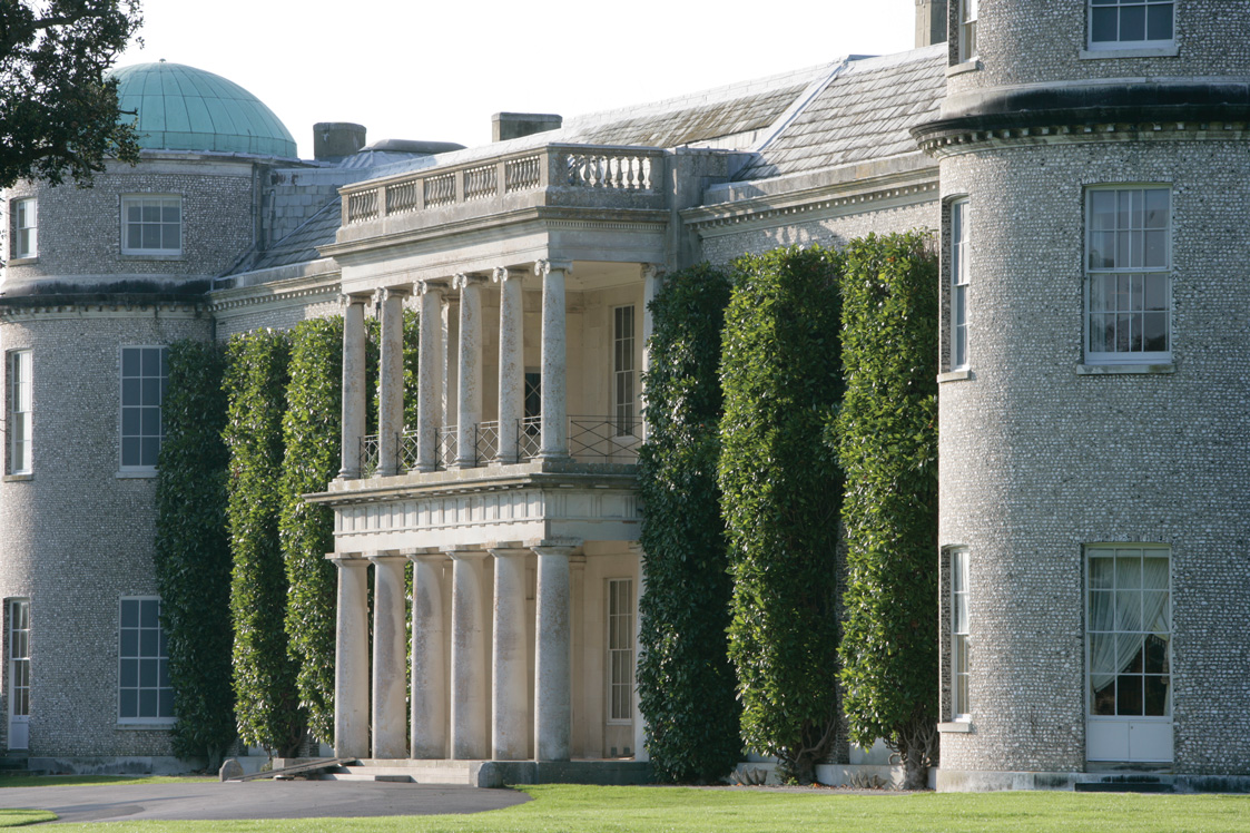 The front entrance of Goodwood House from a side angle.