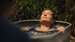 A woman submerged in an ice bath as part of our Goodwood Wim Hof Retreat in West Sussex.